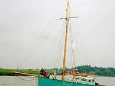 YET - at mooring. Port side.